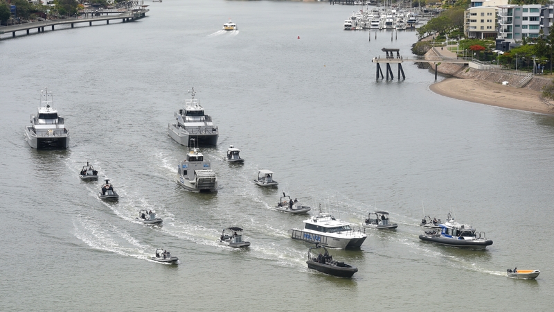 A flotilla of Queensland's Water Police boats patrol on the Brisbane river ahead of the G20 summit