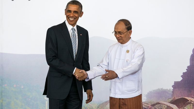 Barack Obama is greeted by Burmese President Thein Sein