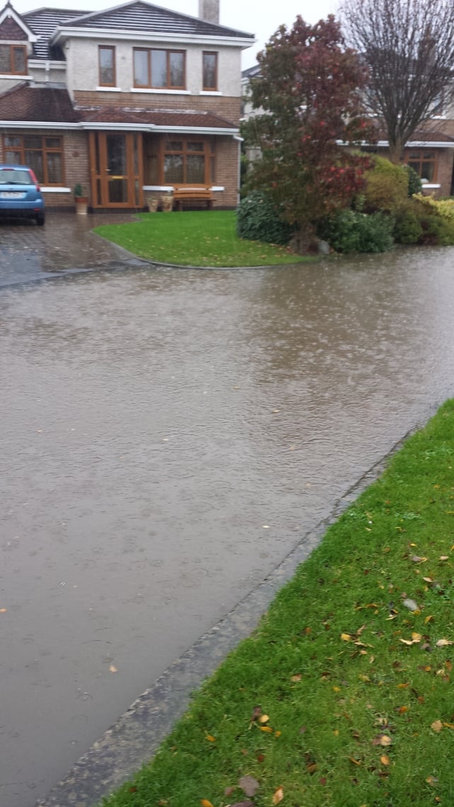 Mandy Connolly photographed flooding outside her home in Hollystown, Dublin