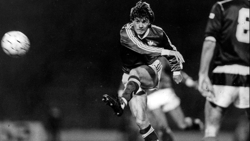 Ray Houghton has a shot on goal