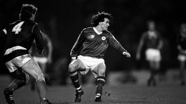 Ray Houghton turns back as the ball moves by