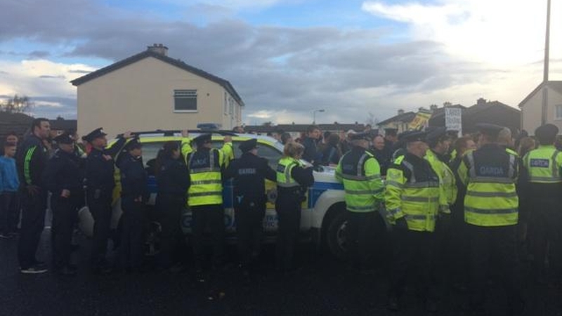 Tánaiste Joan Burton and her entourage were allegedly trapped in a car during the protest