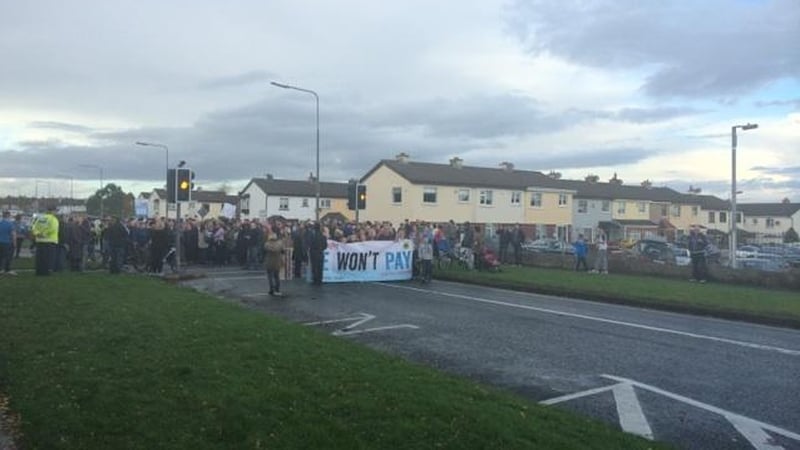The charges arose after former tánaiste Joan Burton and her adviser Karen O'Connell were surrounded by anti-water charges protesters at an event