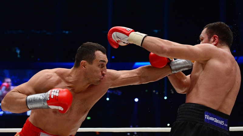Wladimir Klitschko (L) lands a jab on Kubrat Pulev