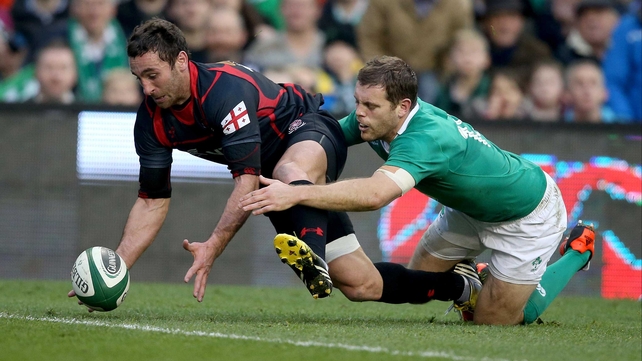 Georgia's Tamaz Mchedlidze prevents Darren Cave from touching down