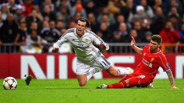 Alberto Moreno gets too close to Gareth Bale during a Champions League clash