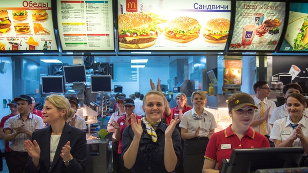 McDonald's staff in Russia celebrate after the fast-food restaurant reopened after a hygiene probe