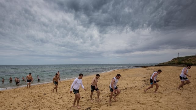 Ireland's International Rules players after a recovery session in the sea on Friday
