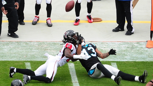 Desmond Trufant of the Atlanta Falcons breaks up a pass intended for Kelvin Benjamin of the Carolina Panthers on Saturday