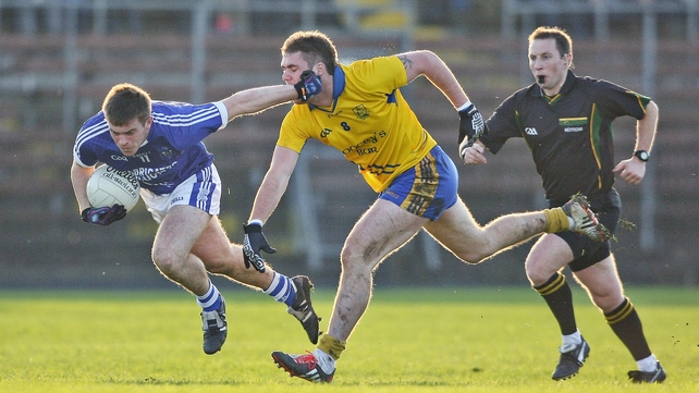 Cratloe's Sean Collins in action against Craig Guiry of The Nire during their Munster Club SFC semi-final on Sunday