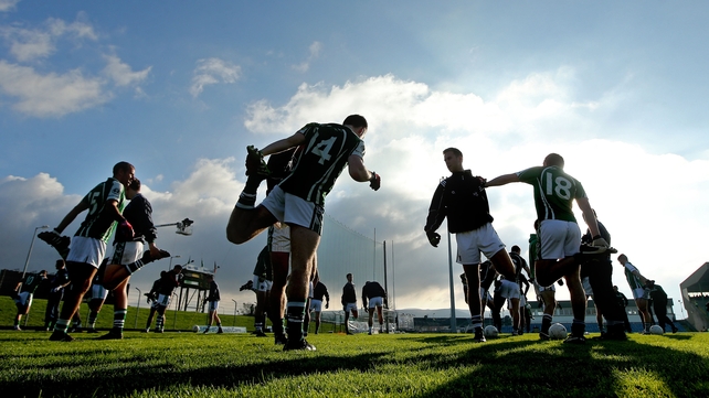 Ballincollig players warm up ahead of their Munster Club SFC semi-final against Austin Stacks on Sunday