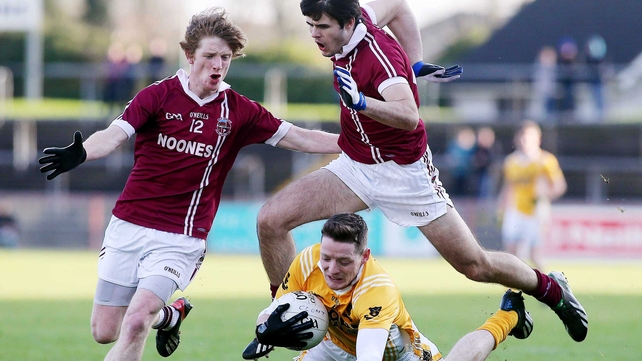 Conor McManus with Roana Bradley and Karl McKaigue during the Ulster Club SFC semi-final on Sunday
