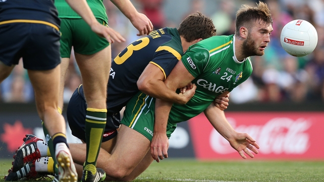 Aidan O'Shea is tightly marked by Brodie Smith