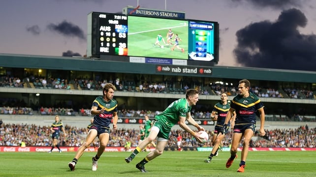 Irish man of the match Conor McManus comes under pressure