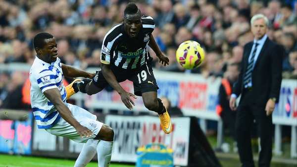 Massadio Haidara takes flight following a tackle from Nedum Onuoha of QPR