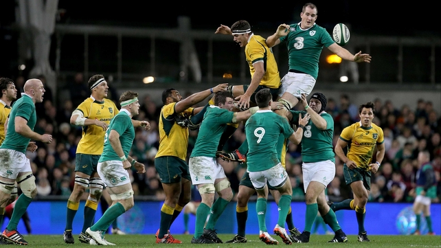 Devin Toner and Sam Carter of Australia contest line-out ball as both teams battle for superiority
