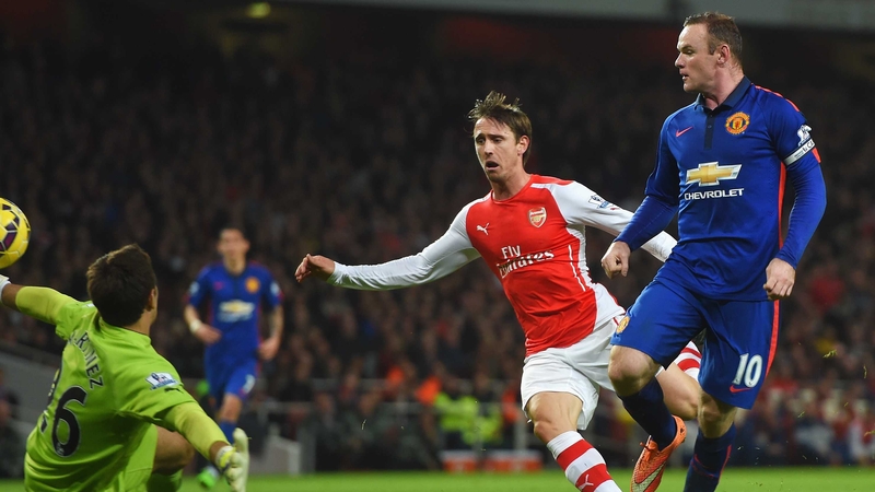 Wayne Rooney watches what proved to be the winning goal head for the back of the net
