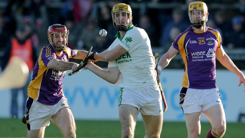 Kilmacud Crokes' Damien Kelly with Colin Fennelly (r) of Ballyhale Shamrocks