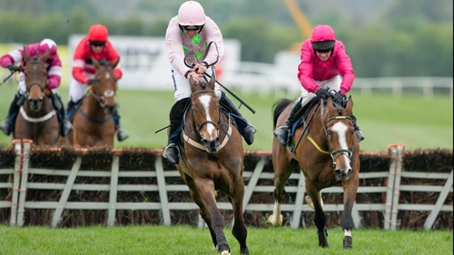 Apache Stronghold (cerise silks) pictured finishing second to Vautour at last season's Punchestown Festival