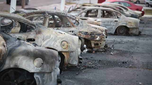 Cars were set on fire when rioting erupted after the grand jury announcement in Dellword, Missouri