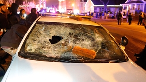 A Ferguson police vehicle was destroyed by protesters