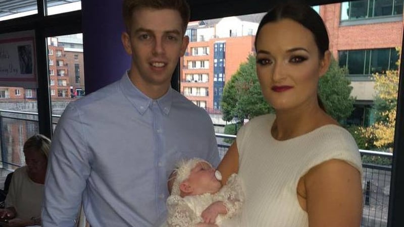 Baby Mila pictured at her christening in September with her parents Derek Healy and Charlene Murphy