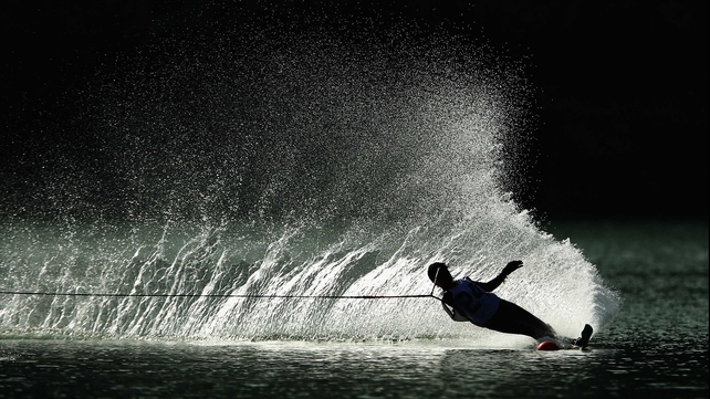 A competitor glides over the water in the ladies waterski slalom at the Asian Beach Games in Phuket