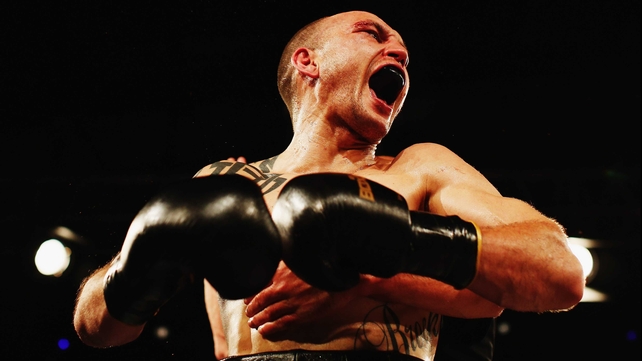 Anthony McCracken of Australia celebrates with a snarl after beating David Aloua in a cruiserweight title bout in Auckland