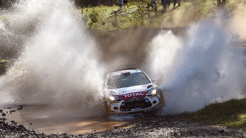 Kris Meeke powers his Citroen through a water crossing on the final day of the WRC Rally of Australia