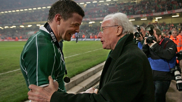 Ireland captain Brian O'Driscoll receives the congratulations of Jack Kyle at the Millennium Stadium in 2009