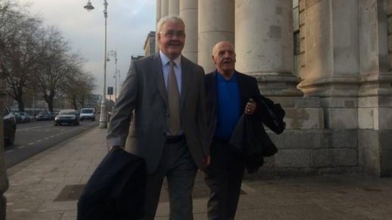Francis McGuigan and Kevin Hannaway arrive at the High Court