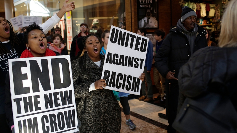 Protesters march through the Galleria near St Louis