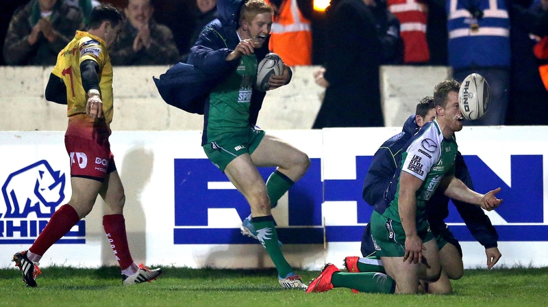 Connacht's Matt Healy celebrates scoring his sides first try with Darragh Leader and Craig Ronaldson