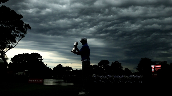 Jordan Spieth of the USA poses with the Stonehaven trophy after winning the 2014 Australian Open