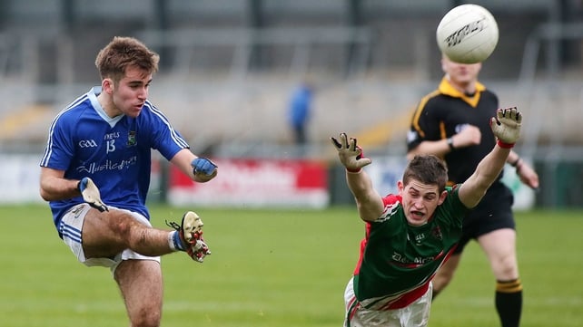Inniskeen's Colm Meegan with Warrenpoint's Donagh McAleenan during the Ulster Club Intermediate Football Championship Final