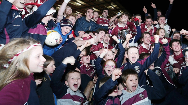 The Slaughtneil team and fans celebrate with the trophy after the Ulster SFC Club final