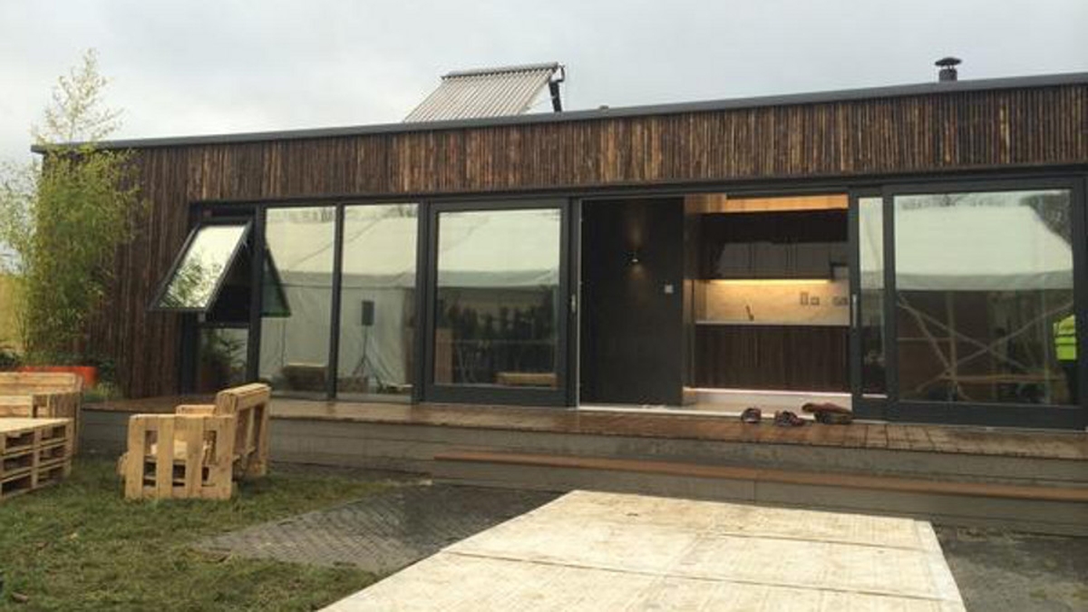 Shipping container adapted as family home