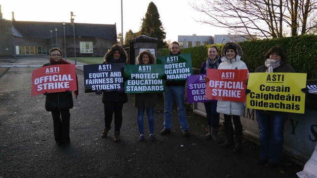 Teachers stand outside Boyne Community College in Trim, Co Meath