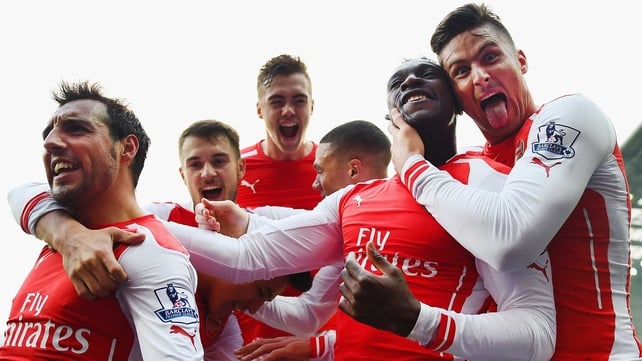 Arsenal players celebrate a Danny Welbeck goal against West Brom at the Hawthorns