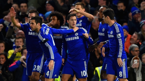 Eden Hazard celebrates with his team mates after scoring Chelsea's opening goal