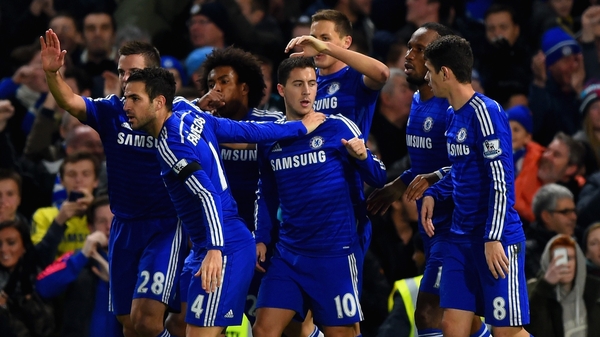 Eden Hazard celebrates with his team mates after scoring Chelsea's opening goal