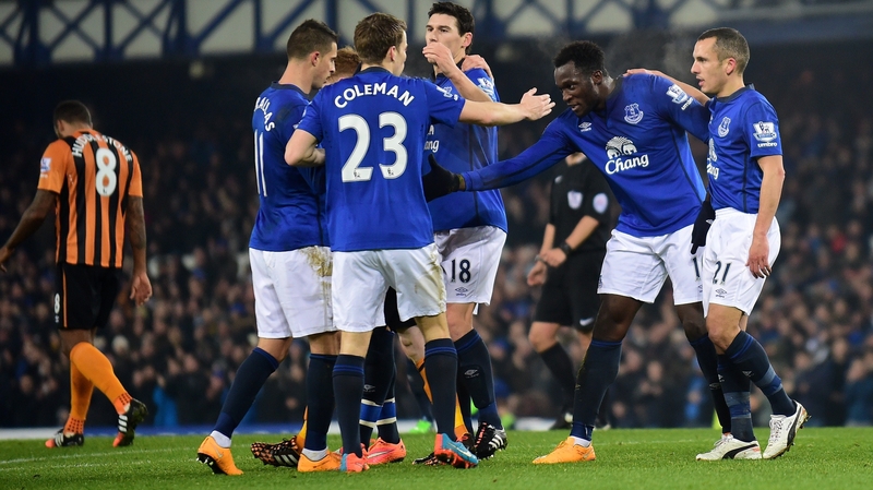 Everton's Belgian striker Romelu Lukaku (2nd R) is congratulated by his team mates after scoring the opening goal