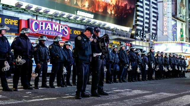 NYPD line up during New York protests over the death of an unarmed black man who died after being held in a chokehold by a white police officer