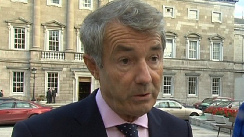 Michael Lowry claims he is being discriminated against in comparison to Charles Haughey