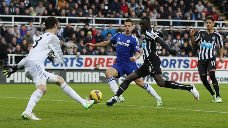 Papiss Cisse scores past Chelsea's Thibaut Courtois