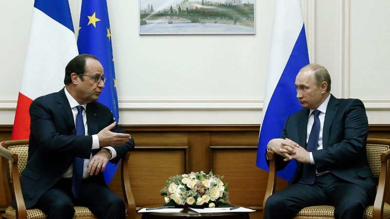 The French president stopped in the Russian capital on the way back home from a visit to Kazakhstan