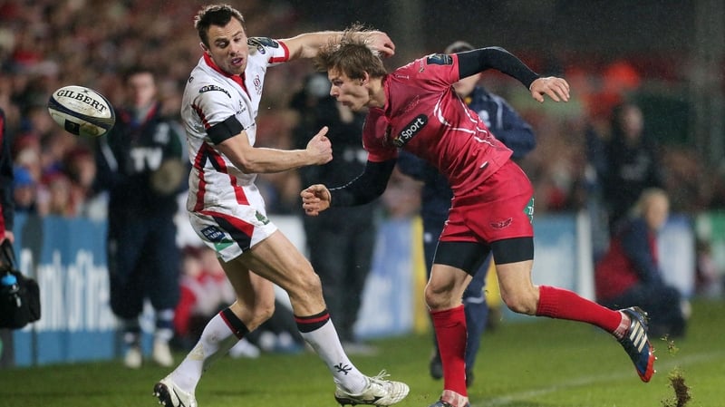 Ulster tryscorer Tommy Bowe battles with Scarlets' Liam Williams