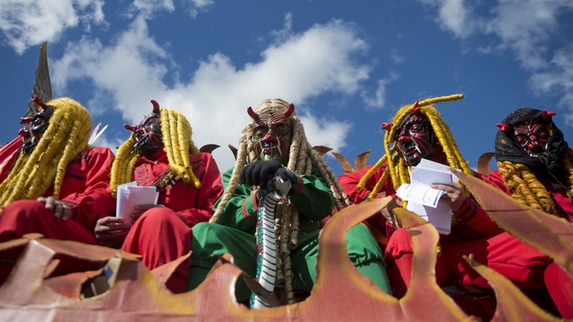 People take part in the '24 devils dance' during the Virgin of the Immaculate Conception celebrations in Sacatepequez, Guatemala