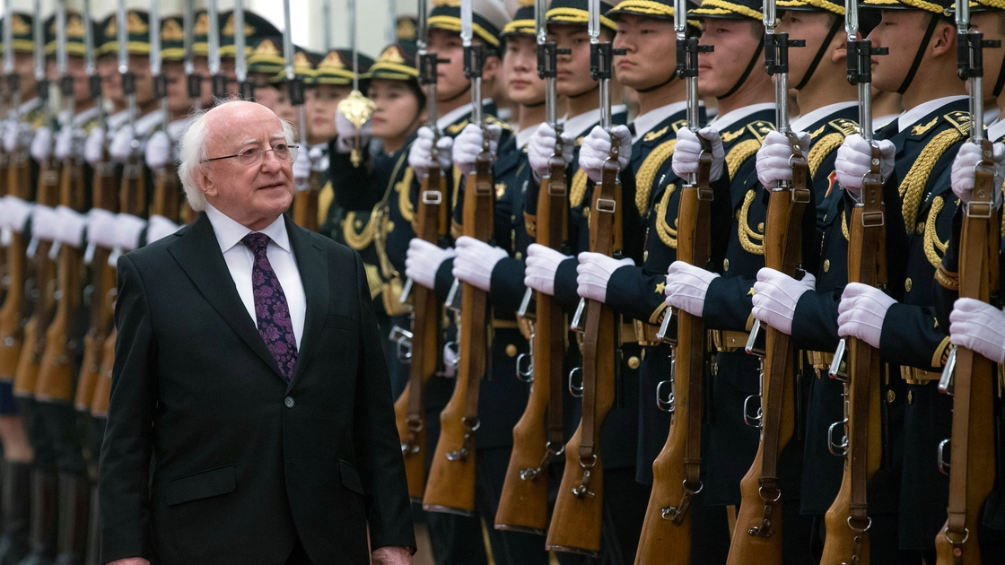 President Michael D Higgins inspects a guard of honour during a visit to China in 2014