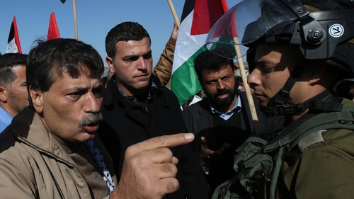 Palestinian official Ziad Abu Ein (L) died en route to Ramallah after the incident